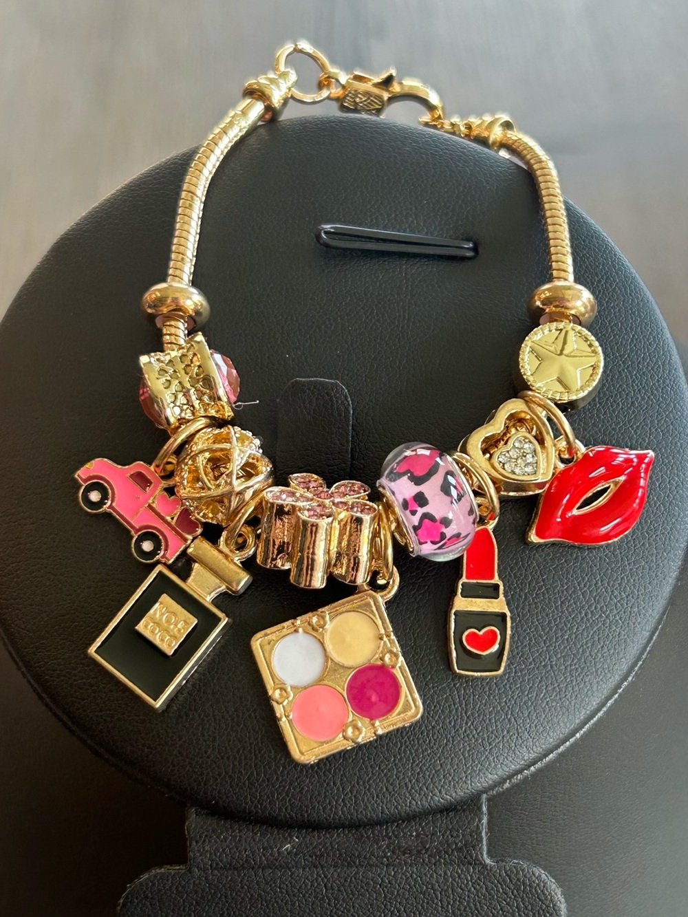 Brand New Gold Charm Bracelet with Pink and Red Enamel Makeup Charms